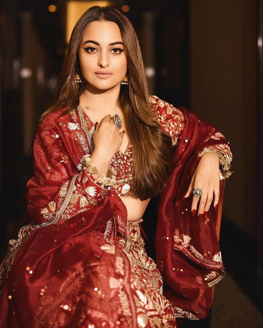 Sonakshi Sinha Wearing Beautiful Earrings Jewellery Maroon Gown